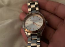 Micheal Kors watch for women Gold and silver CASH ONLY.