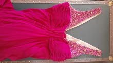 فستان طويل رسمي فوشيا اللون مستعمل للبيع size L