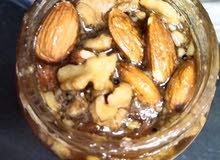 عسل نحل جبلي طبيعي و عسل بالمكسرات عسل نحل جبلي طبيعي و عسل بالمكسرات