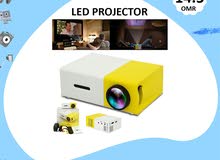 Mini LED Projector Portable White & Yellow (New Stock)
