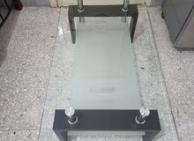 Glass and wooden table