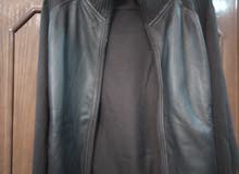 جاكيت شتوي من محلات داوود تايكواندو فرع الصويفيه (جلد وقماش) ماركة Baumler جديد (Winter jacket)