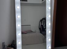 big mirror with lights