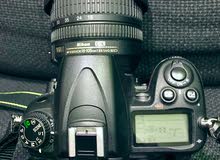 للبيع كاميرا نيكون Nikon D7000 مع كامل معداتها وملحقاتها الأصلية