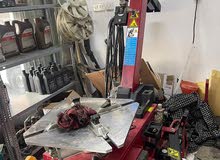 Air compressor and tire removal racks for sale بيع رفوف وكمبريسر وجهاز فك الاطارات