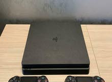 ps4 slim with 2 controll and 3 games