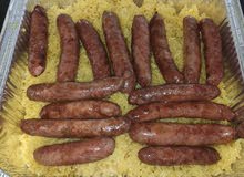 طبق سجق جريل يكفي فردين + طبق رز اصفر كبير + 2 حواوشي لحمة بلدي + سلطات طبق سجق جريل يكفي فردين + طبق رز اصفر كبير + 2 حواوشي لحمة بلدي + سلطات