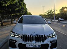 BMW X6 X DRIVE 400i 2022بحالة الوكالة
