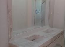 مطلوب فني مغاسل رخام طبيعي Worker working in the field of natural marble, installing washbasins مطلوب فني مغاسل رخام طبيعي Worker working in the field of natural marble, installing washbasins