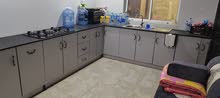 wood kitchen cabinets with basin