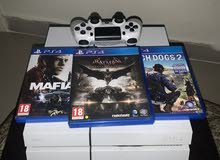 PlayStation 4 with three games  بلاستيشن فور مع ثلاث سيديات