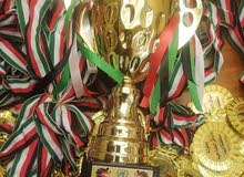 كوؤس واعلام وميداليات ودروع شهادات تكريم وشعارات