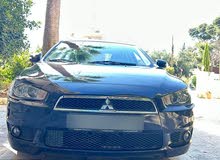 ميتسوبيشي لانسر EX 2016 وكالة الشركة التجارية الاردنية  بحالة ممتازة جدا مالك واحد فقط 10200 دينار