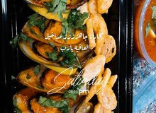 سطل السي فود والبريانى والايسكريم بالبقلاوة والكنافة وورق العنب والزنجبارى سطل السي فود والبريانى والايسكريم بالبقلاوة والكنافة وورق العنب والزنجبارى