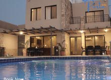 بورتو فيلا الجديدة كلياً للإيجار اليومي"مسبح مدفئ"
