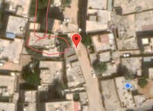 قطعة أرض مقام عليها منازل قطعة أرض مقام عليها منازل