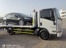 نقل المركبات والمعدات داخل وخارج عمان للتواصل