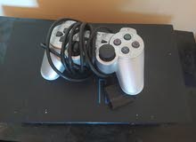 PlayStation 2 disque dur avec une manette grise PlayStation 2 disque dur avec une manette grise