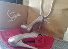 Lou Boutin heels