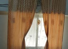 جمع مجزي بشكل فضفاض ستائر في اليمن