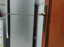 fridge & wooden 4 door cupboard