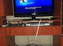 ps4 fat with 2 games and 2 original controller