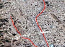 أرض للبيع في ريف دمشق على الشارع العام  1220  متر ..