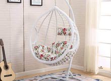selling brand new swing with pillow;;; selling brand new swing with pillow;;;