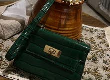 شنطة صغيره خضرا