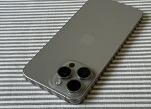Iphone 15 pro max natural titanium 256GB used like new under warranty