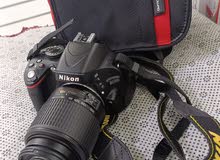 Nikon D5100 with( lens 50-200 mm ,charger,Bag)