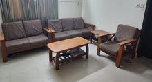 Wooden Sofa Set 3+2+1  and tables in good condition.