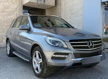 مرسيدس ML 350 موديل 2013 بحالة ممتازة! فرصة اقتناءSUV من الوكالة تجمع بين الأداء والاناقة لمالك واحد