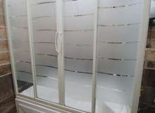 Ideal Standard Bath tub with shower cabinبانيو ايديال ستاندرد و كابينة شاور Ideal Standard Bath tub with shower cabinبانيو ايديال ستاندرد و كابينة شاور