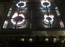4 burner gas stove working perfectly in excellent condition