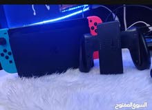 NINTENDOSWITCH OLED  للبدل فقط مع جميع ملحقاته ومع حساب فيه العاب