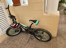 BMX bicycle with helmet and airpump for urgent sale in excellent condition