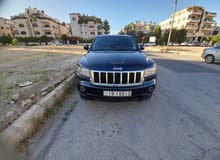 Jeep Grand Cherokee 2011                                                          Laredo 4x4