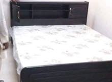 Brand New bed wood with medical metriss Queen size