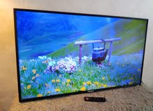 شاشة جي جارد حجم 50 انش فل سمارت تدعم خاصية 4k مع الريموت والقواعد بسعر 140 د موجودة في بيت بعمان