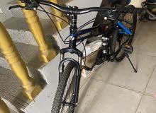 دراجة رانج روفر (سيكل) جديده مستخدمه اسبوع فقط مع ملحقاتها مجانا