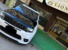 جيب شيروكي ملك العضلات الامريكي SRT8  موديل 2014 لون ابيض للايجار فقط من عند مكتب Lion  Group