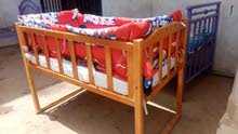سرير اطفال خشب