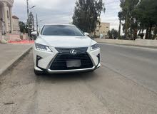 لكزس RX450hL موديل 2018 لون ابيض لؤلؤي وارد وصيانه الوكاله اعلى تصنيف من فئتها