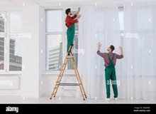 fixing curtains and frames photo clock tv and other items installation services provided all Muscat