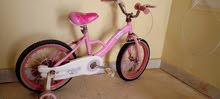 دراجة هوائية لون بناتي زاهي استعمال بسيط
