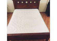 Bed with mattresses