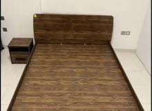 Queen size cot with mattress and side table