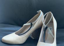 Clarks size 36 EU nude colour with wood heels and T-bar strap