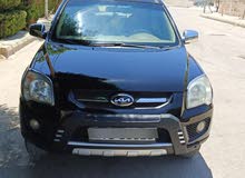 كيا سبورتاج 2009 كرت ابيض مميزة جداً سعر قابل للتفاوض